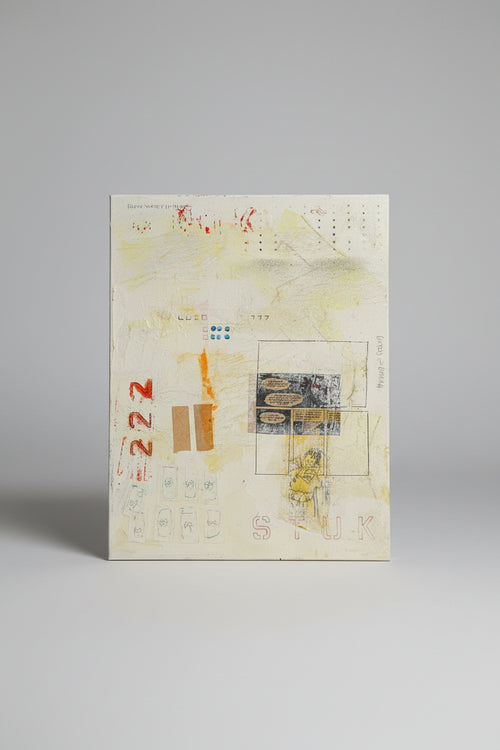 Sheet of paper with printed text and graphics attached to a brick wall.